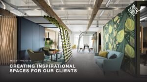 Creating Inspirational Spaces For Our Clients slide featuring an image of a modern office interior with workspace dividings