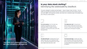 Is your data stack stalling? Beyond the legacy DMP eBook for Decentriq page page 3 showing a woman at work walking with a tablet in her hands looking at data room
